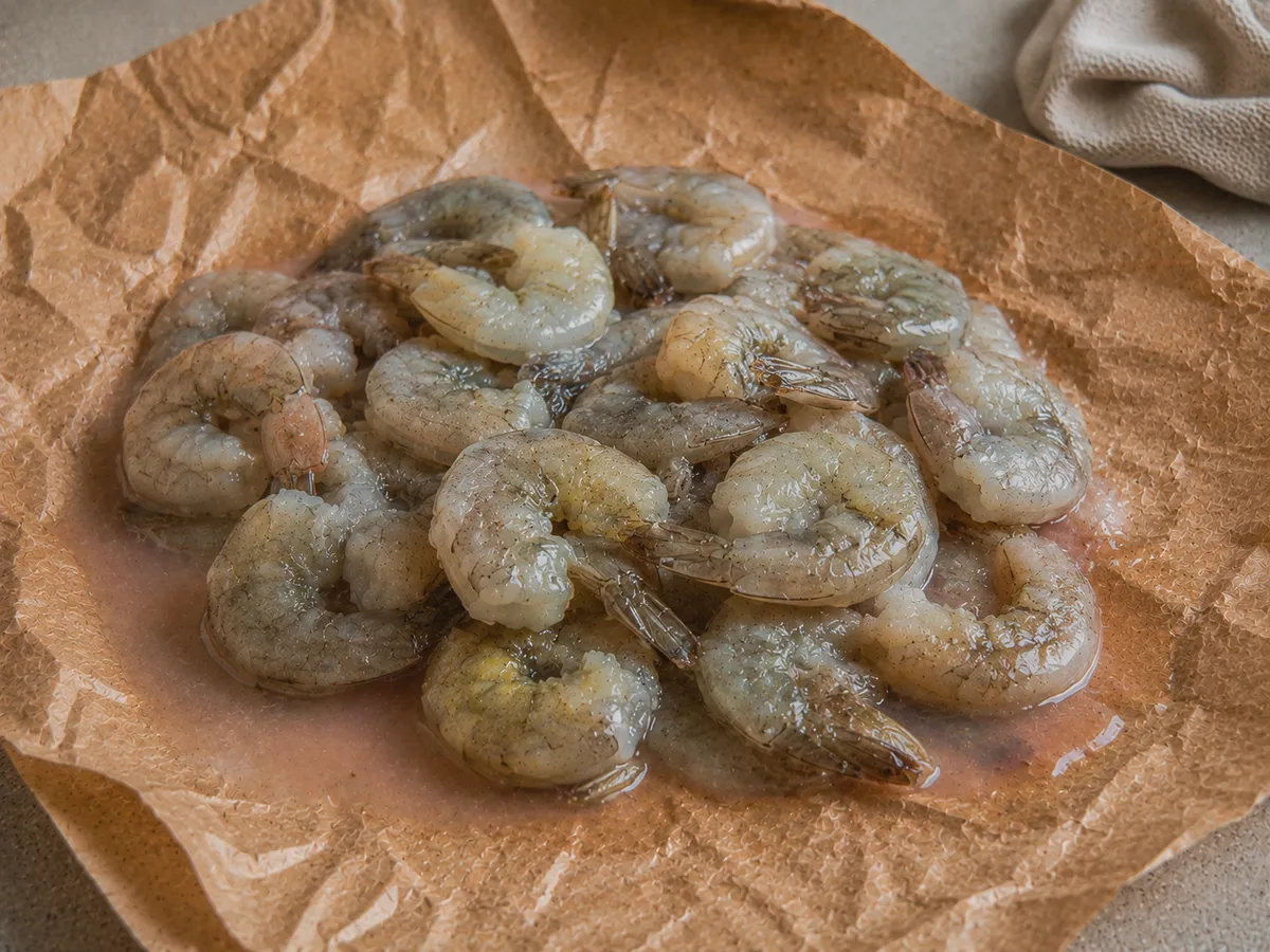 Spot the signs of spoilage before frozen shrimp reaches your plate.